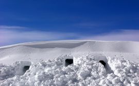 Snow caves Wallpaper