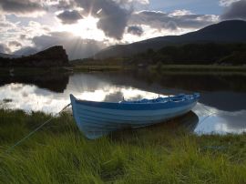 Boat in Sunset Lake Wallpaper