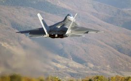 F22 over hills Wallpaper