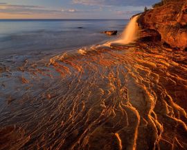 Waterfall in sunset Обои