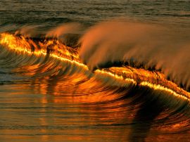 Sunset in the waves Обои